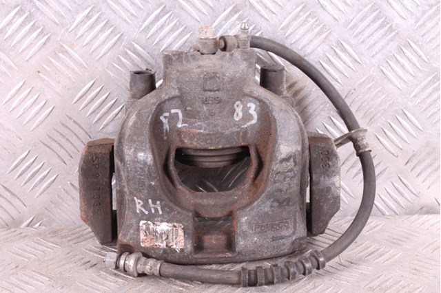 Супорт гальмівний, передній, правий DG9Z2B120A FORD