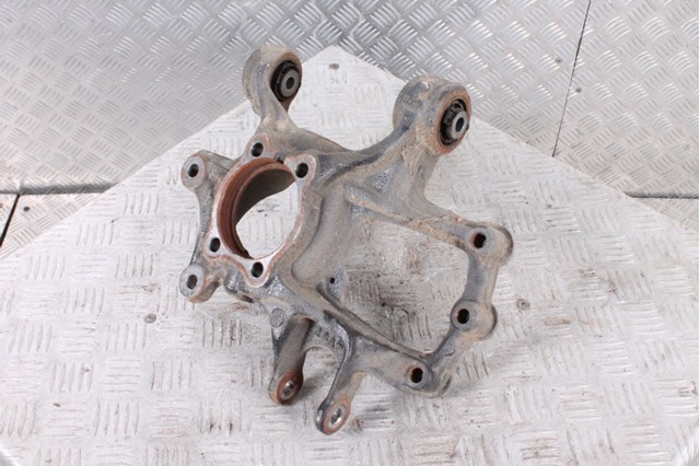 Цапфа поворотна ліва GHP92612X MAZDA