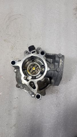 Насос вакуумний 06K145100BB VAG