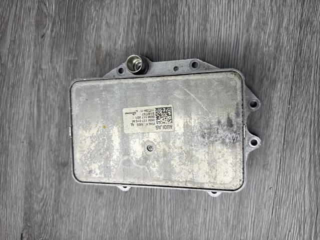 Радіатор масляний 06M117015M VAG