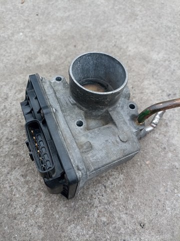 Дросільна заслінка в зборі MN195709 MITSUBISHI