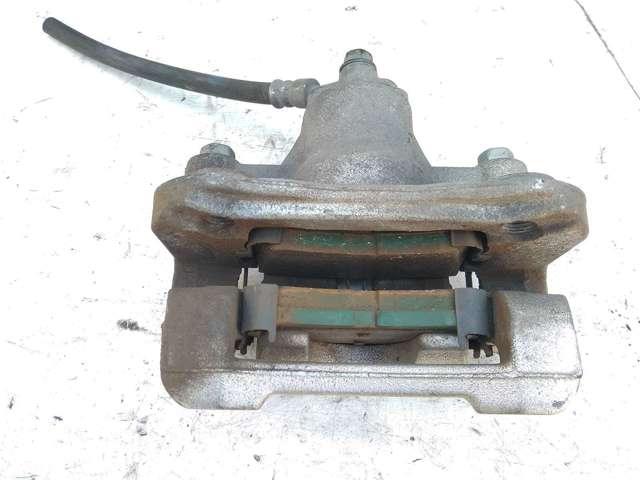 Задній гальмівний супорт лівий 58310C1A00 HYUNDAI