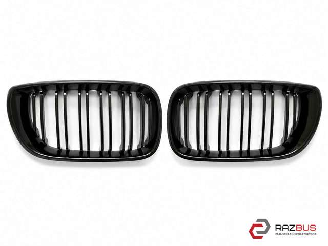 Решітка радіатора ліва 51137042961 BMW