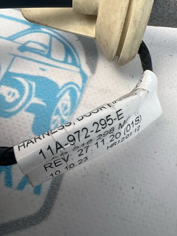 Трос замка дверей передніх лівих 11A972295E VAG