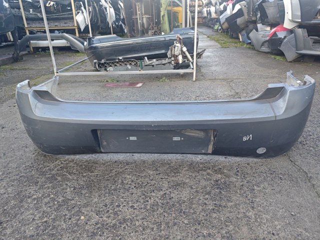 Кожух бампера заднього 09186137 OPEL