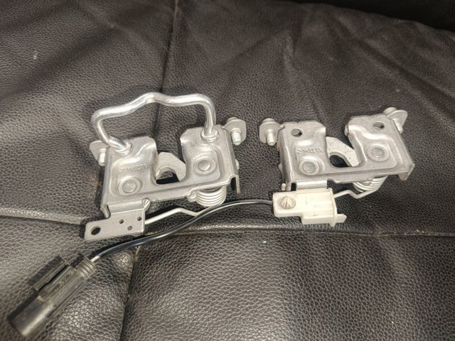 Замок кришки капота 51237210731 BMW