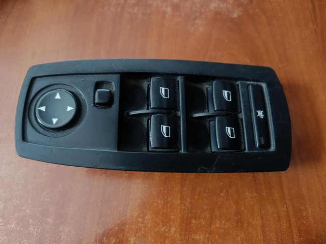 Кнопки переднього лівого склопід'ємника 61313414352 BMW