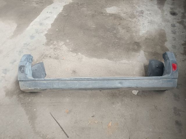 Бампер задній 8200150631 RENAULT