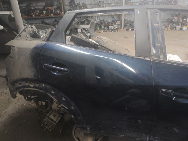 Двері пасажирські задні праві DKY07202XB MAZDA