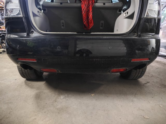 Буфер (бампер) задній EG2150221 MAZDA