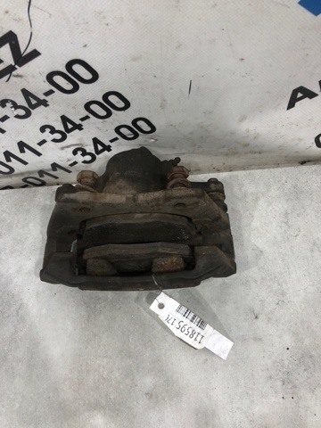 Скоба гальмівного супорта переднього 1500658 FORD