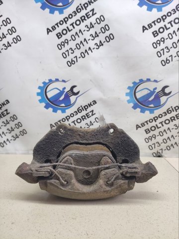 Супорт гальмівний, передній, лівий 1682876 FORD