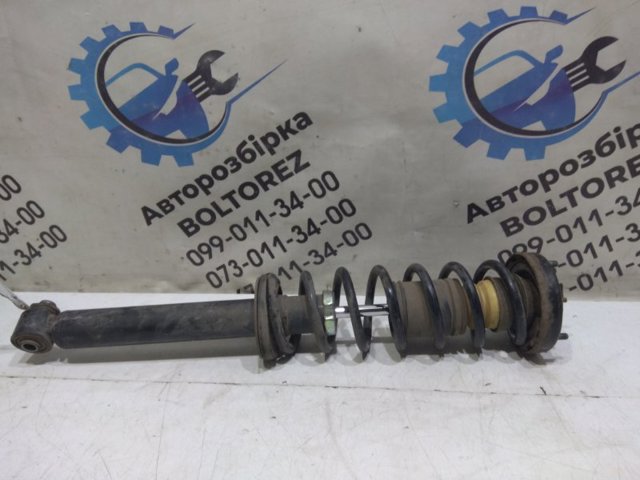 Амортизатор задній 33521093646 BMW