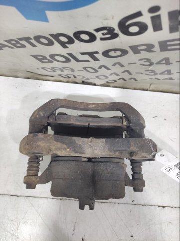 Супорт гальмівний, передній, правий 41001EB32A NISSAN