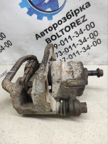 Супорт гальмівний задній правий 440018H300 NISSAN