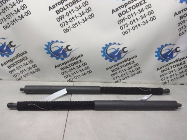 Амортизатор двері задньої 4G8827665B VAG