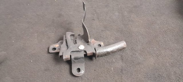 Замок кришки капота 57310SG010 SUBARU