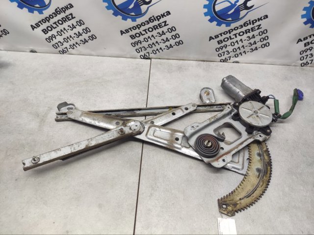 Механізм стеклопідйомника дверей передніх, лівих 62112FC010 SUBARU