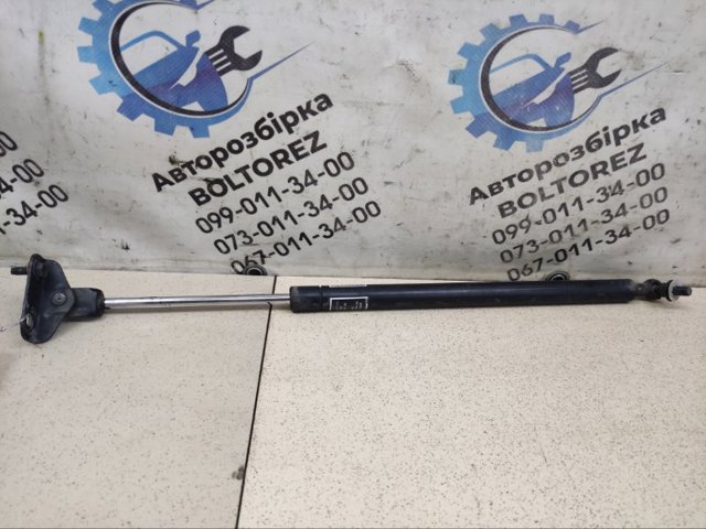 Амортизатор двері задньої 63269SC010 SUBARU