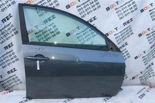 Пасажирські передні двері 80100AV632 NISSAN