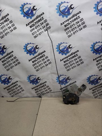 Замок задньої двері, лівої 825033Y500 NISSAN