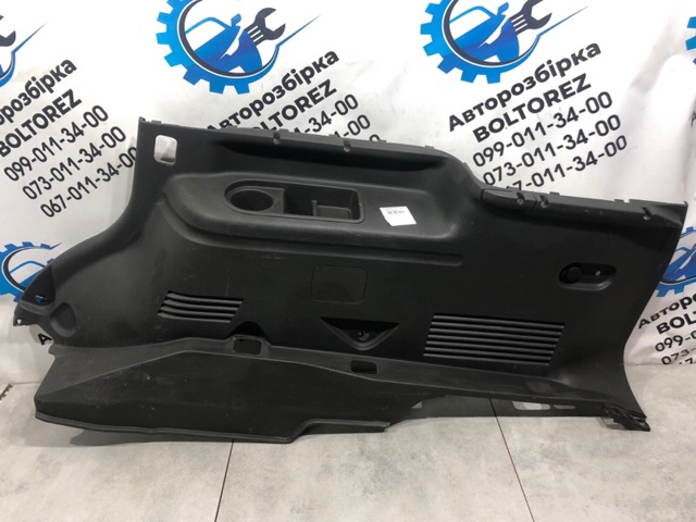 Облицювання багажного відсіку, праве 84950EB602 NISSAN
