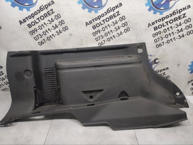 Облицювання багажного відсіку, ліве 84951EB312 NISSAN