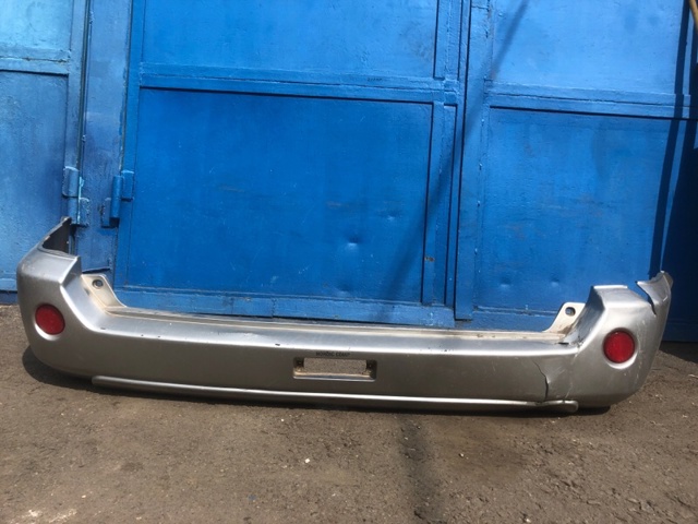 Бампер задній 85022EQ025 NISSAN