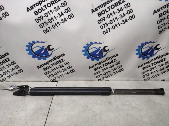 Амортизатор двері 3/5-ї задньої 90451JG400 NISSAN