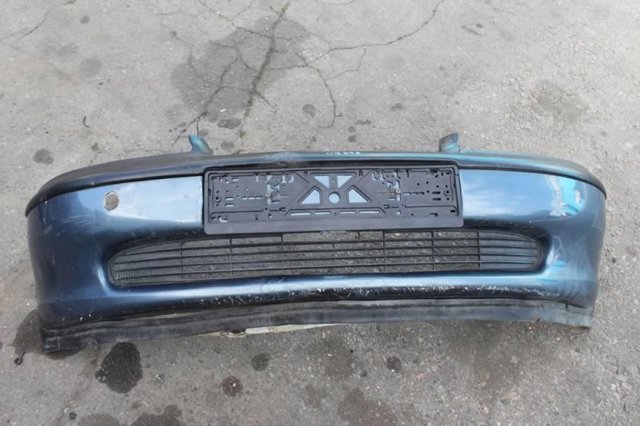 Кожух бампера переднього 90464527 OPEL