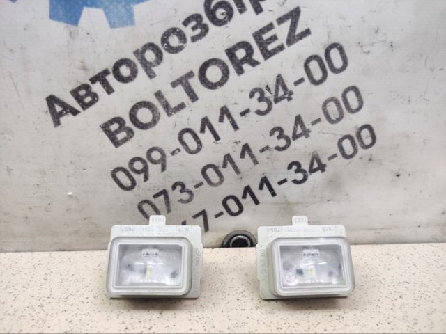 Ліхтар підсвічування заднього номерного знака A0999067000 MERCEDES