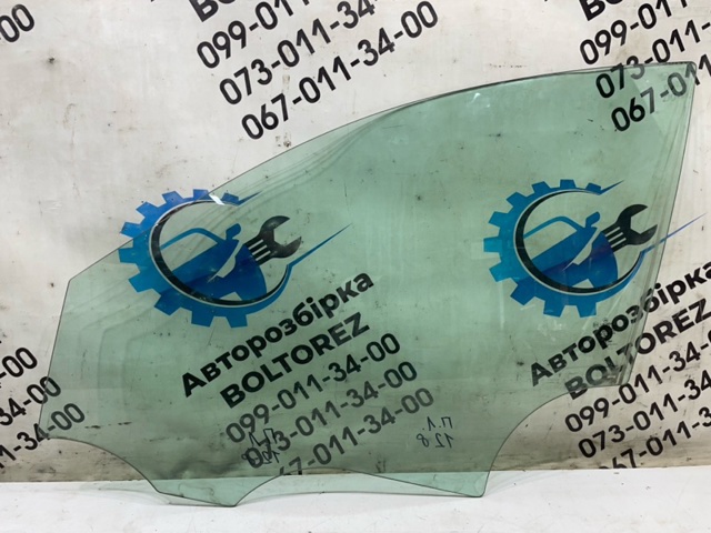Скло водійських дверей A2057250010 MERCEDES