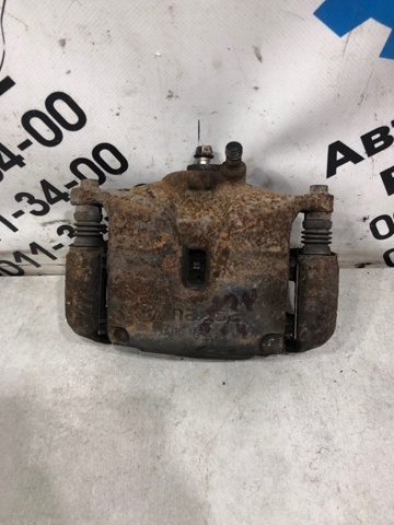 Супорт тормзной B4Y73399ZC MAZDA