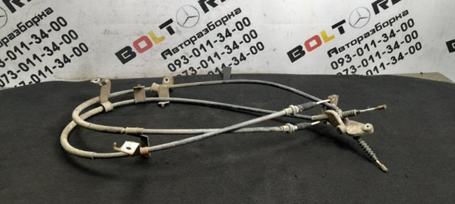 Трос ручника задній лівий EG2144420F MAZDA