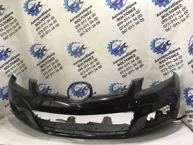 Кожух бампера переднього EH1050031 MAZDA