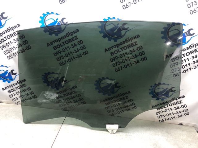Скло заднє ліве GHK573510B9D MAZDA