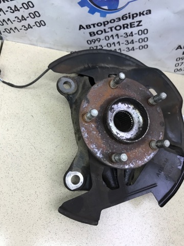 Цапфа передня ліва GHP933031A MAZDA