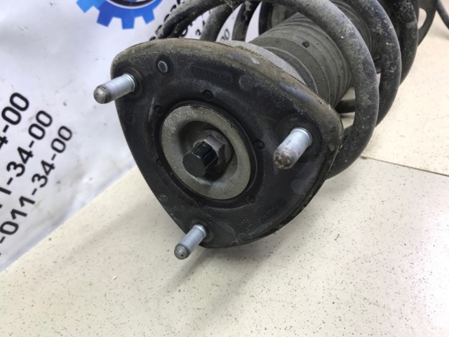 Ліва передня стійка GMM634900 MAZDA