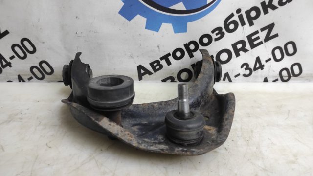 Важіль передньої підвіски верхній, правий GS1D34200C MAZDA
