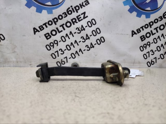 Обмежувач відкриття дверей, передній MB819507 MITSUBISHI