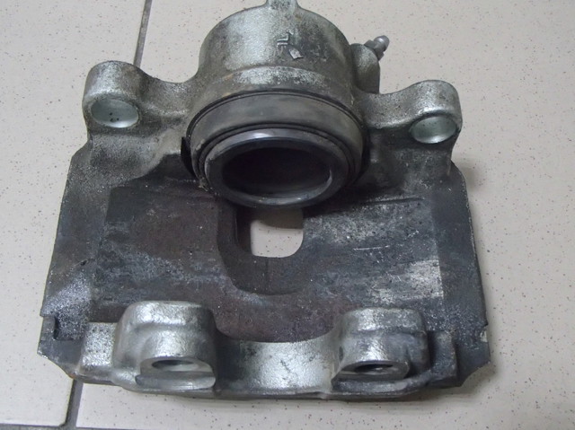 Супорт гальмівний, передній, правий 1835113 FORD