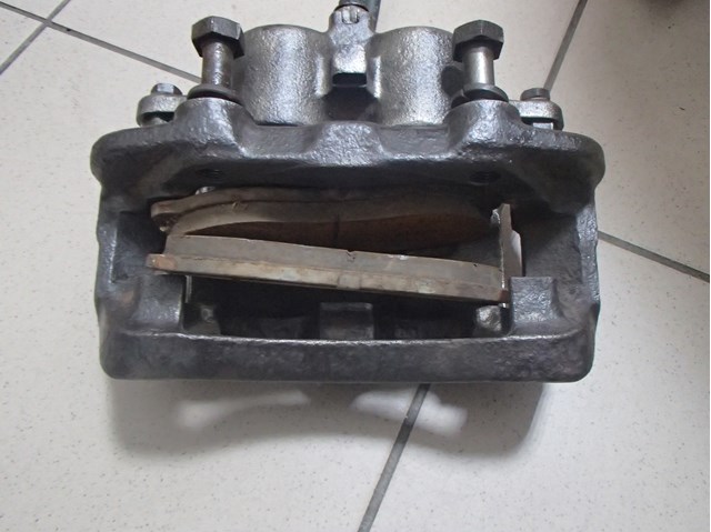 Супорт тормзной 410110F000 NISSAN