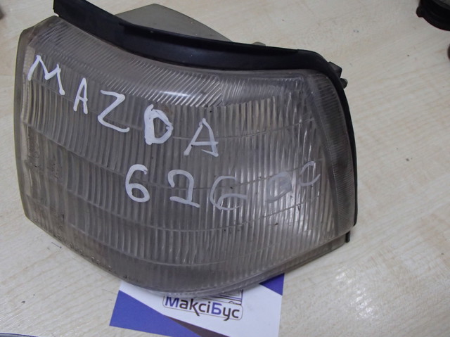 Габарит передній правий GB9089662A MAZDA