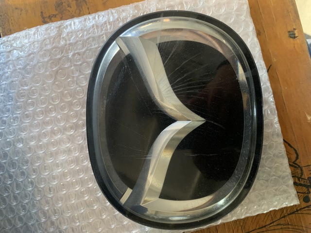 Фірмовий значок капота GHR651730 MAZDA