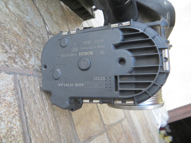 Дросільна заслінка в зборі AG9E9F991AA FORD