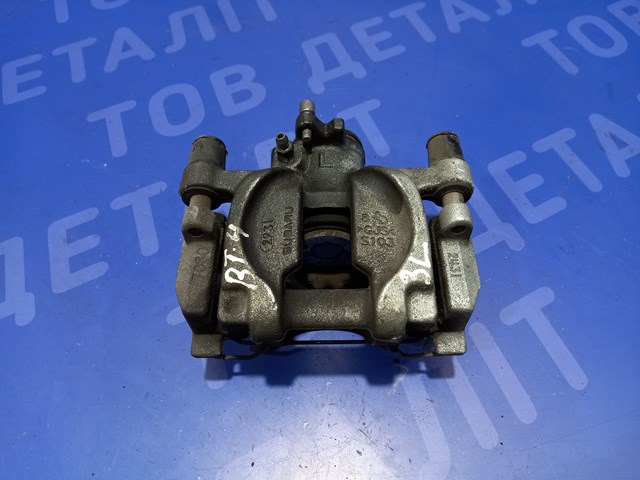 Задній гальмівний супорт лівий 26634AN01A SUBARU