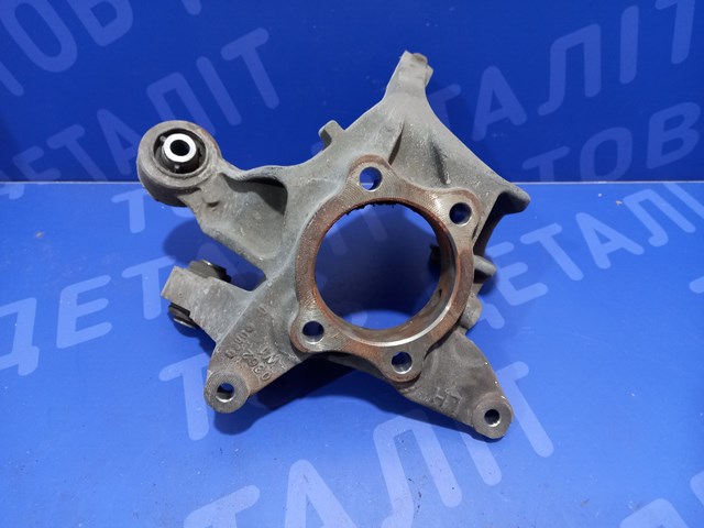 Цапфа - поворотний кулак задній, лівий 28411AL03A SUBARU