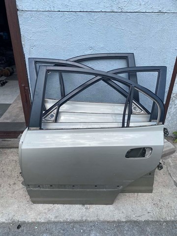 Двері пасажирськи задні ліві 770032D031 HYUNDAI