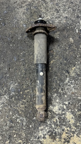 Амортизатор задньої підвіски 56210CB025 NISSAN