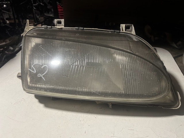 Фара передня права 0301048312 FORD